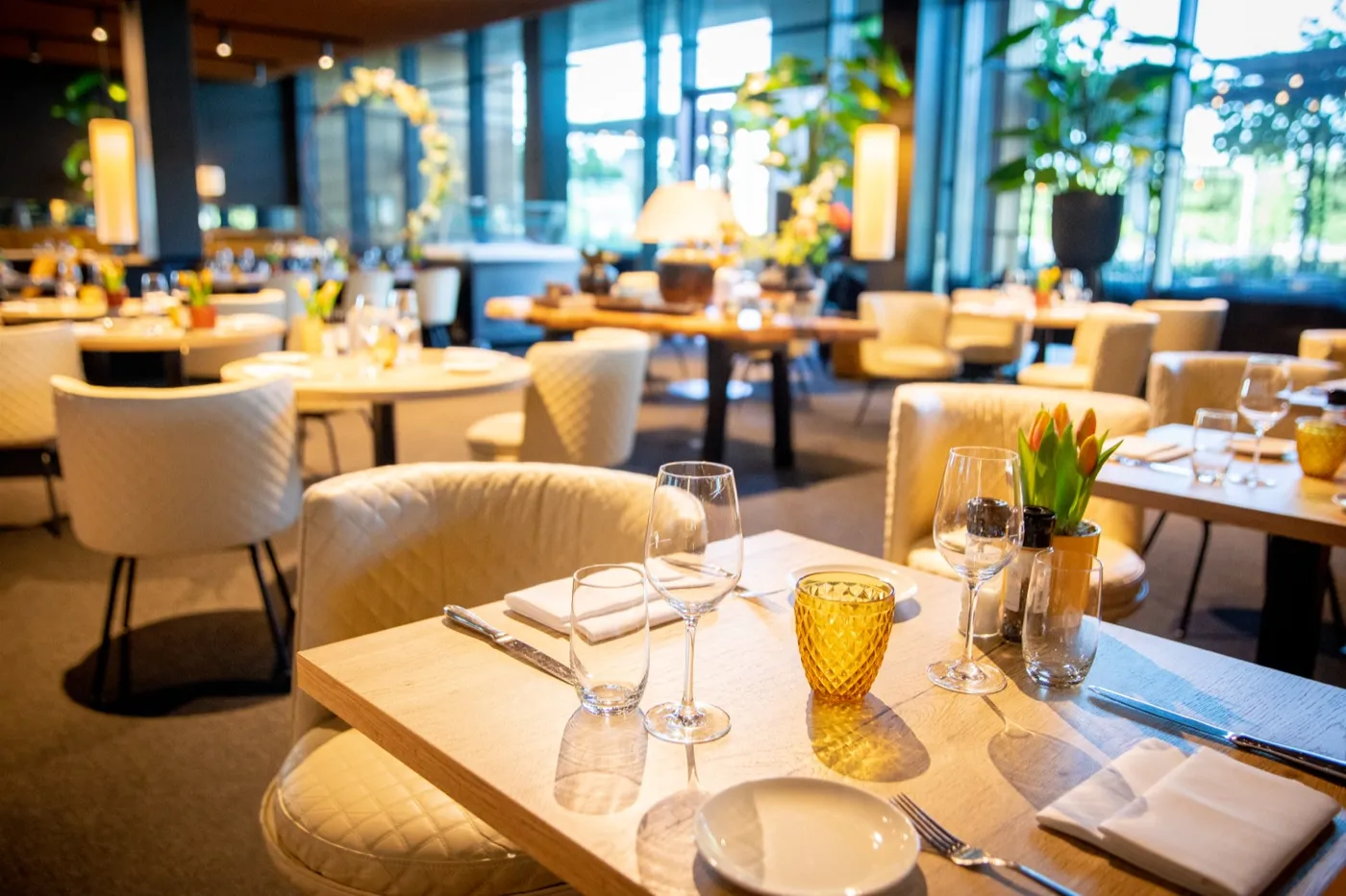 Bright tables at the hotel’s Surf Restaurant, set for lunch