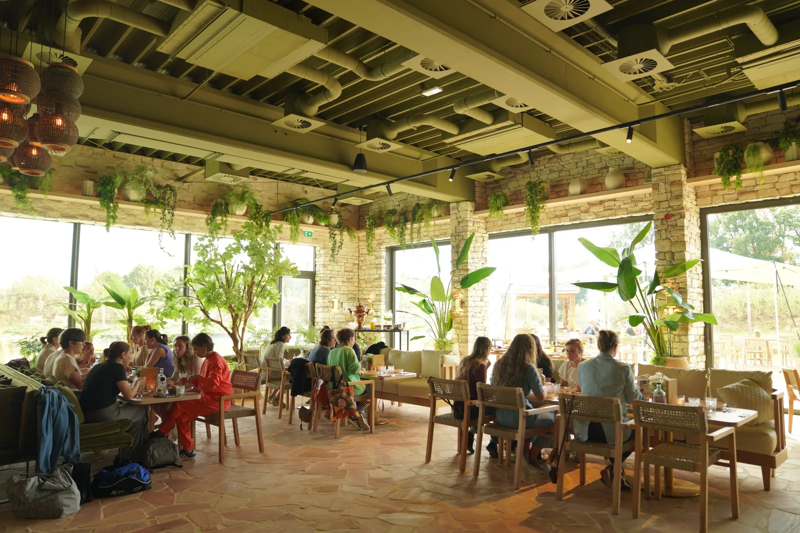 The lunch room, full of plants and light